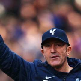463472875-crystal-palace-manager-tony-pulis-waves-as-he-walks-out